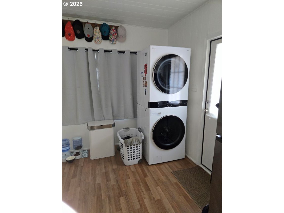 16901 Southeast Division Street Portland, OR 97236 - Photo 7 of 14 a utility room with dryer and washer