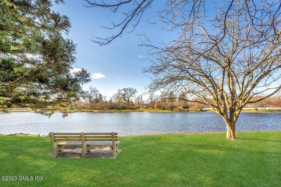 1 Home Place, Unit A Greenwich, CT 06830 - Photo 19 of 22 a view of a lake with houses in the back