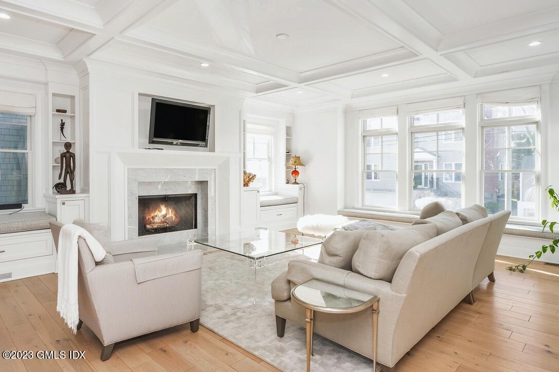 1 Home Place, Unit A Greenwich, CT 06830 - Photo 3 of 22 a living room with furniture a flat screen tv and a fireplace