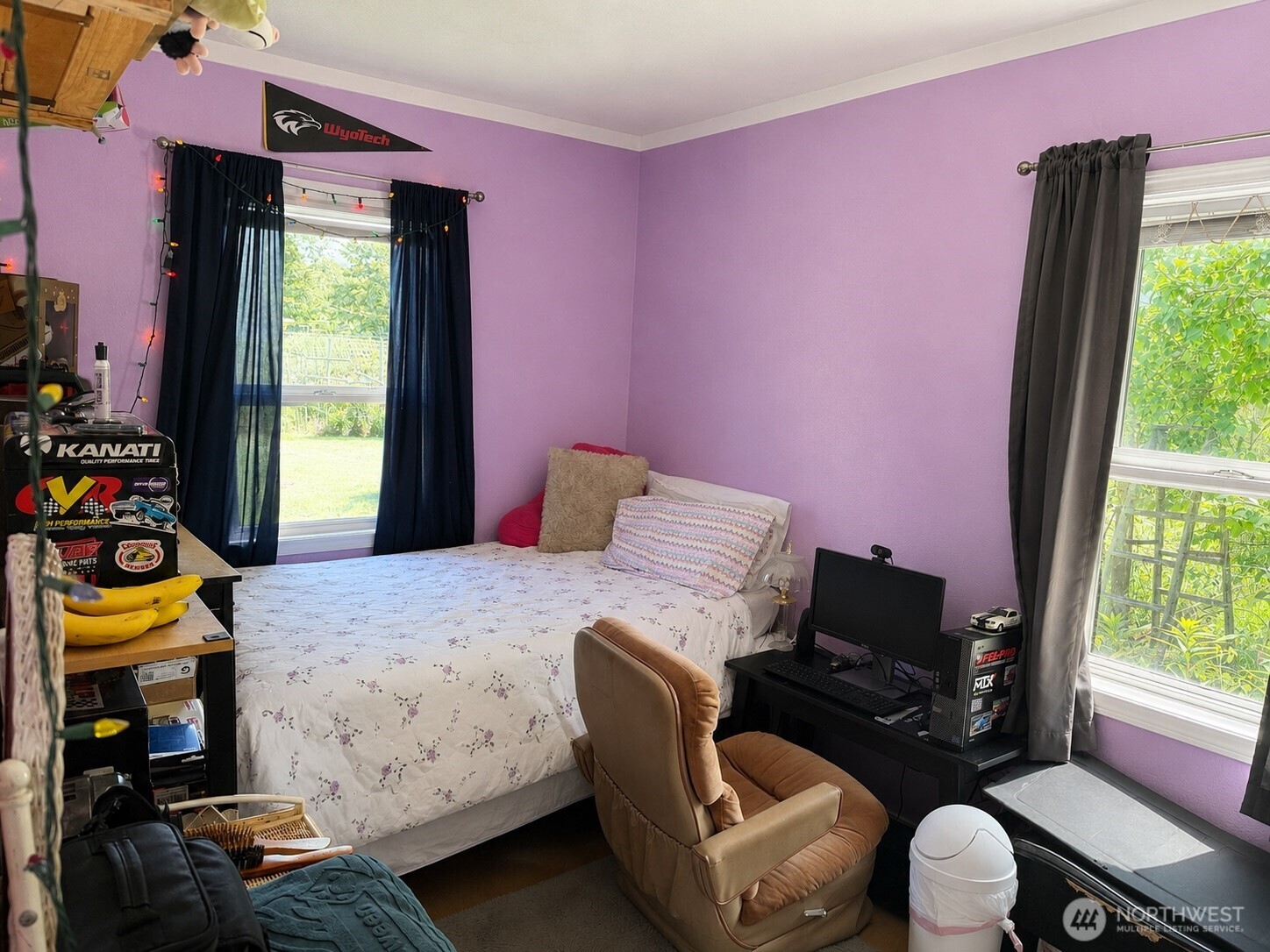 902 Harding Road Aberdeen, WA 98520 - Photo 5 of 18 a bedroom with a bed and a chair