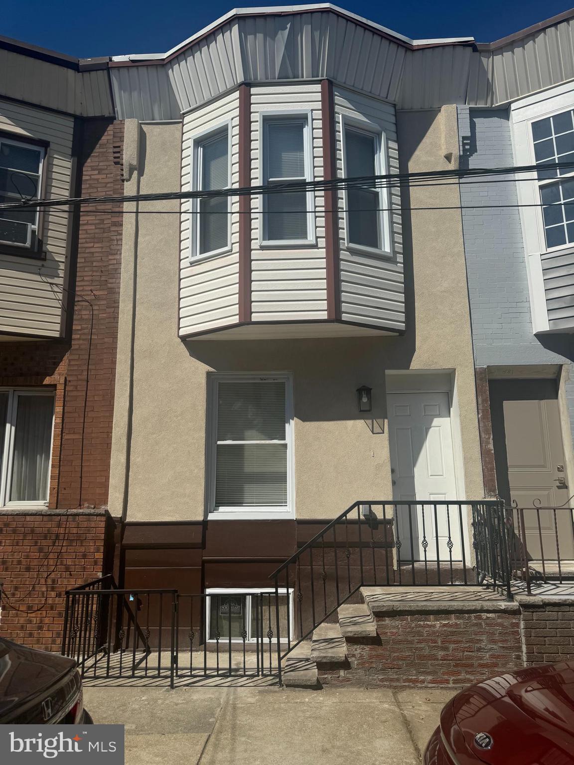 a front view of a house with a balcony
