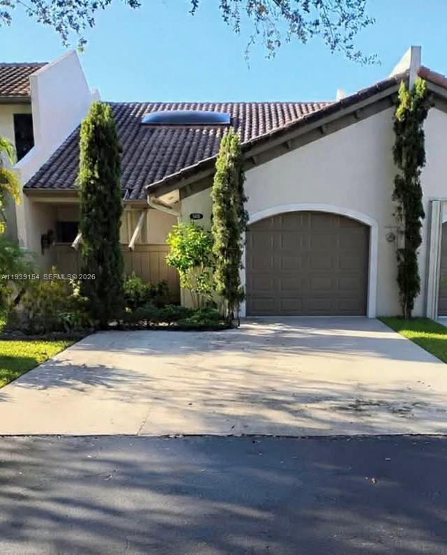 11438 Southwest 86th Lane Miami, FL 33173 - Photo 1 of 17 a view of a house with a patio