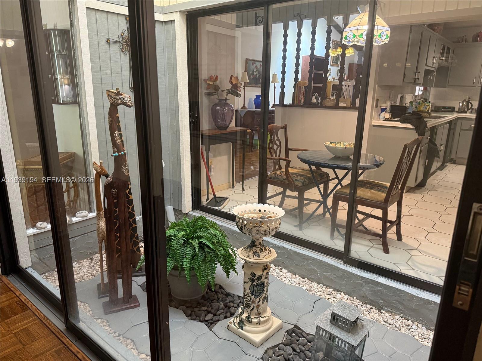 11438 Southwest 86th Lane Miami, FL 33173 - Photo 3 of 17 a view of living room and dining room