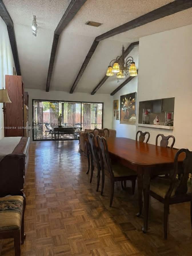 11438 Southwest 86th Lane Miami, FL 33173 - Photo 7 of 17 a view of a dining room with furniture