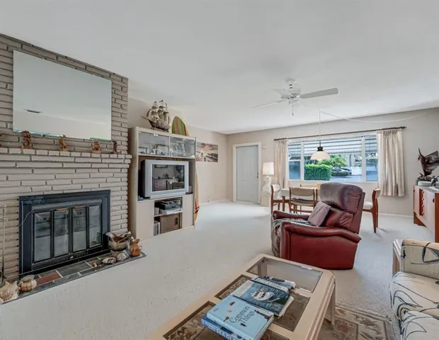 a living room with furniture or fireplace and a flat screen tv