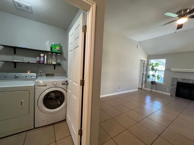 a view of a backyard of a house