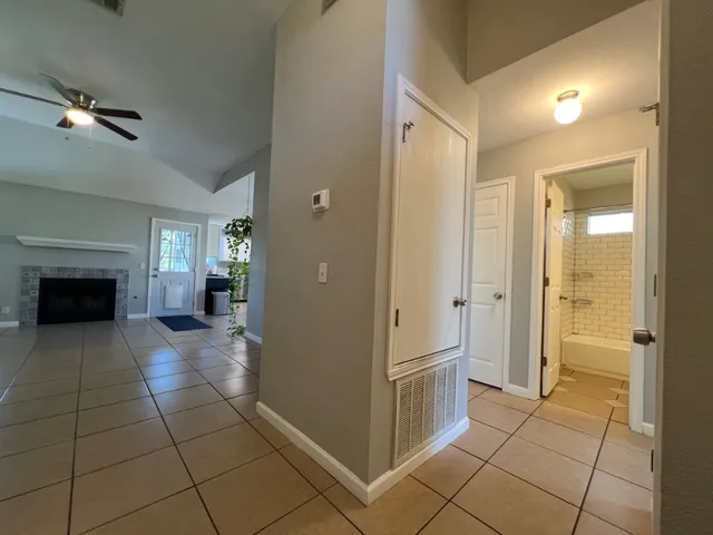 a view of an empty room with a window