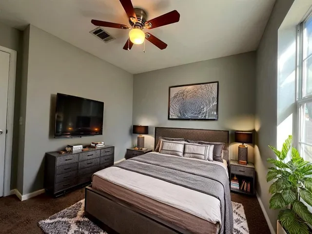 a bathroom with a sink a toilet and bathtub