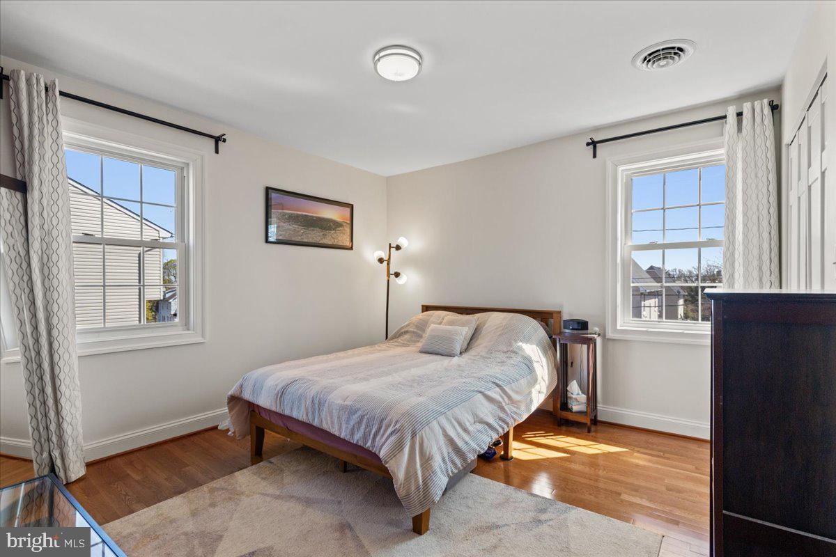435 Kenneth Square Baltimore, MD 21212 - Photo 23 of 35 a bedroom with a bed and a window