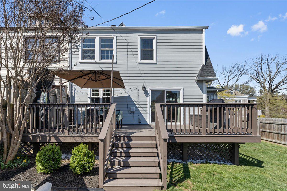 435 Kenneth Square Baltimore, MD 21212 - Photo 31 of 35 a view of a deck with chairs and iron fence
