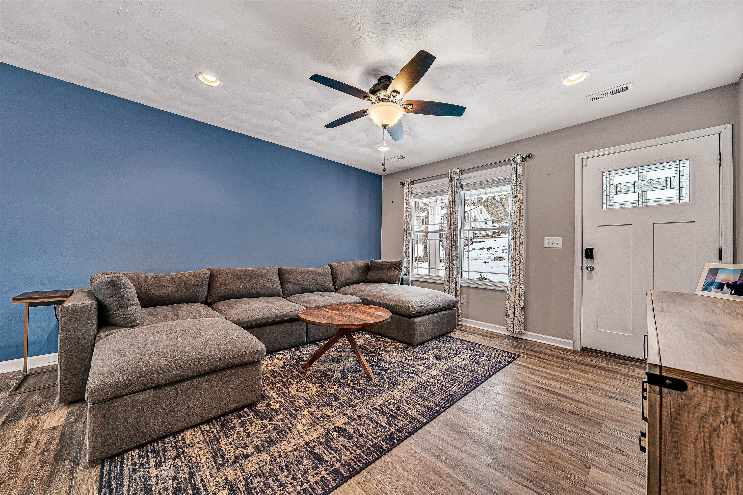 2111 Woodland Road Southeast Roanoke, VA 24014 - Photo 3 of 31 a living room with furniture and a wooden floor