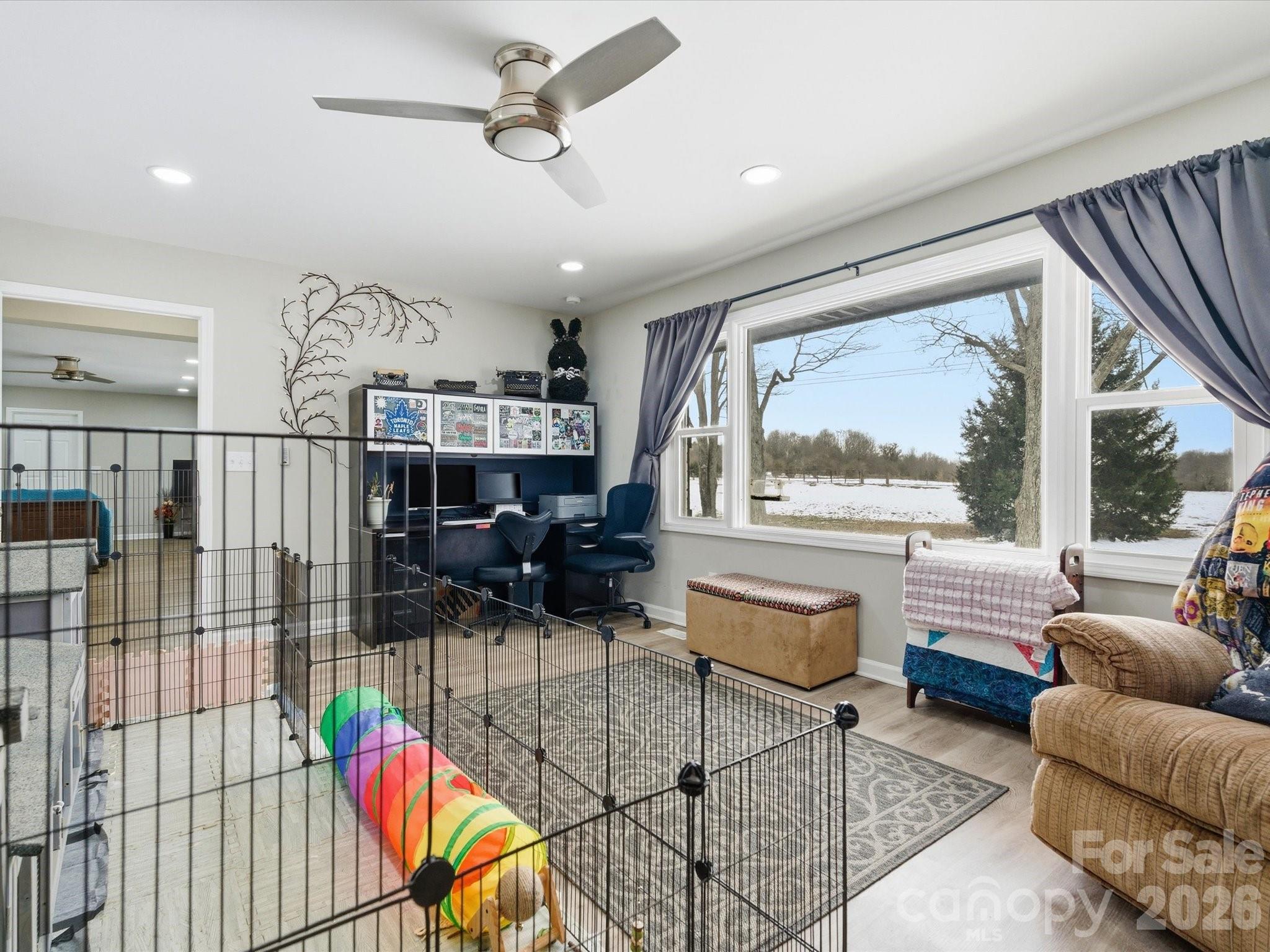 1804 Highway 161, Unit 1 Clover, SC 29710 - Photo 23 of 46 a bedroom with furniture and a large window