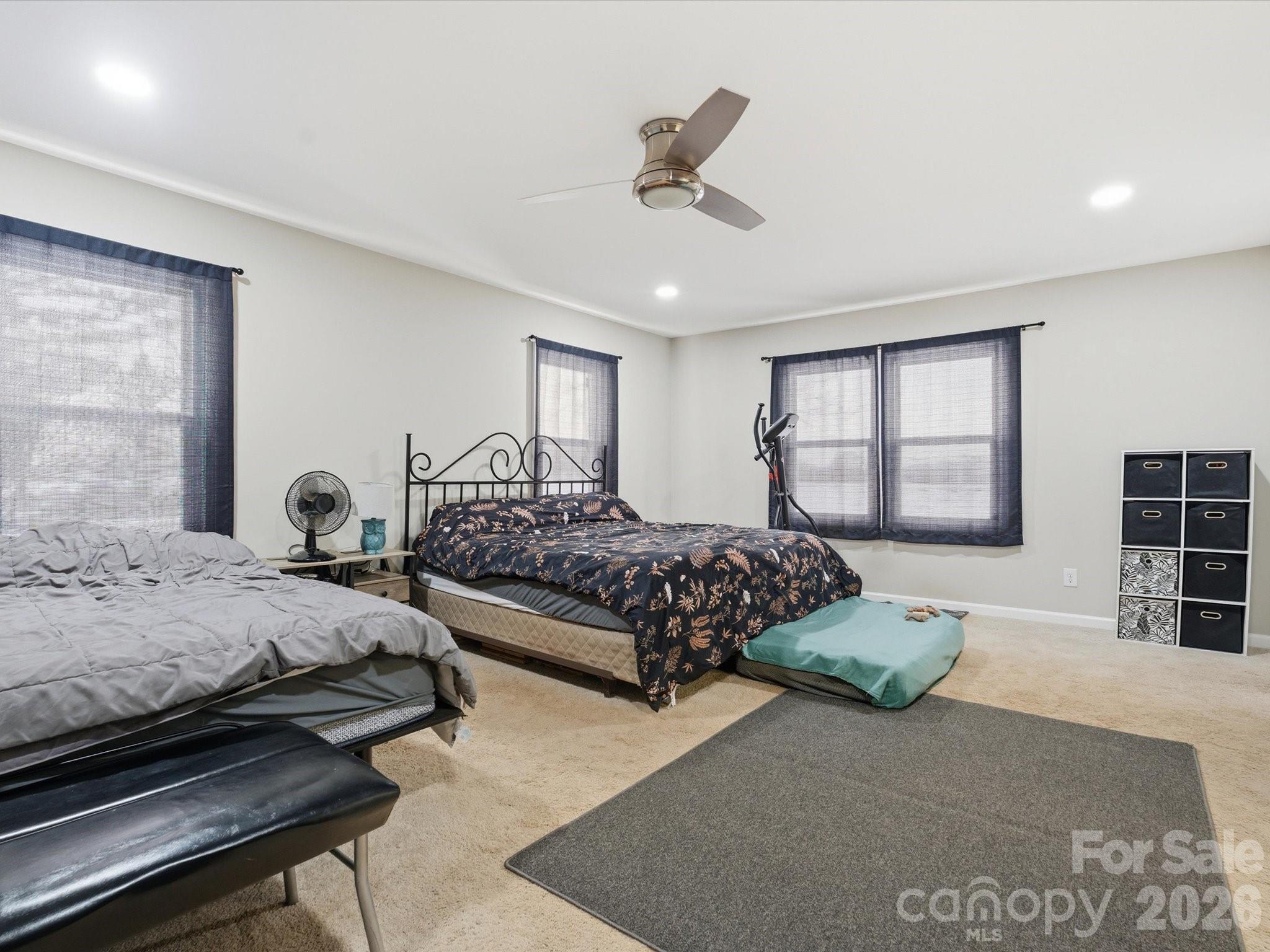 1804 Highway 161, Unit 1 Clover, SC 29710 - Photo 25 of 46 a bedroom with a bed and wooden floor