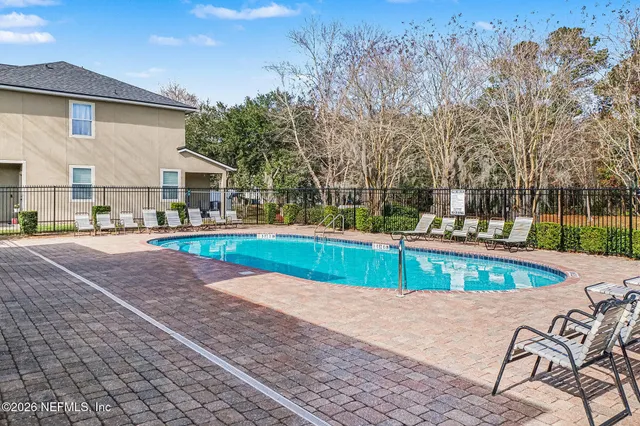 a view of a house with a swimming pool