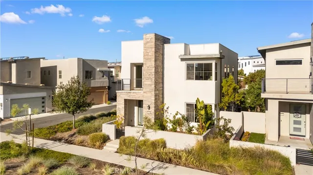 a front view of a house with outdoor space