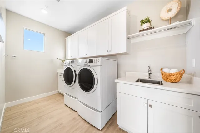 a white toilet sitting next to a bath tub