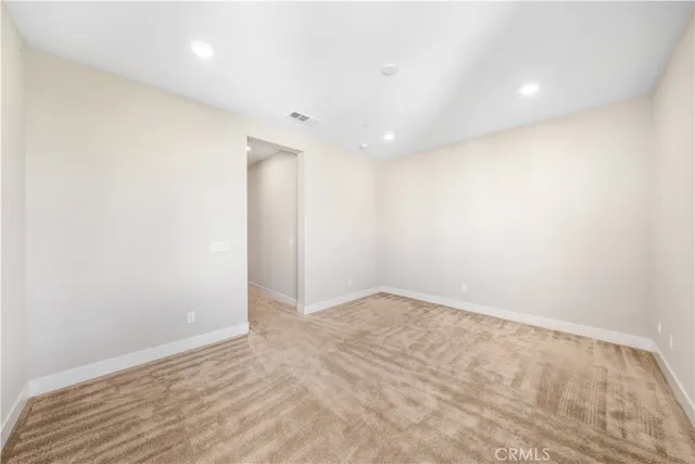 a view of a park with swings and slides