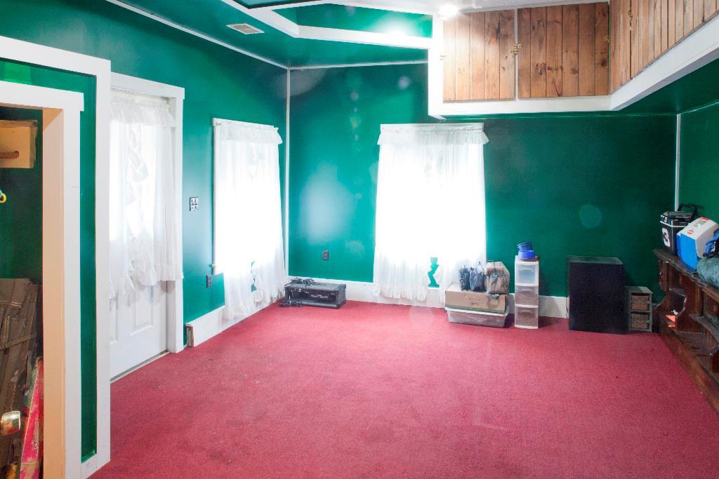 1223 Great Pond Road Aurora, ME 04408 - Photo 23 of 28 1st floor family room would make an...