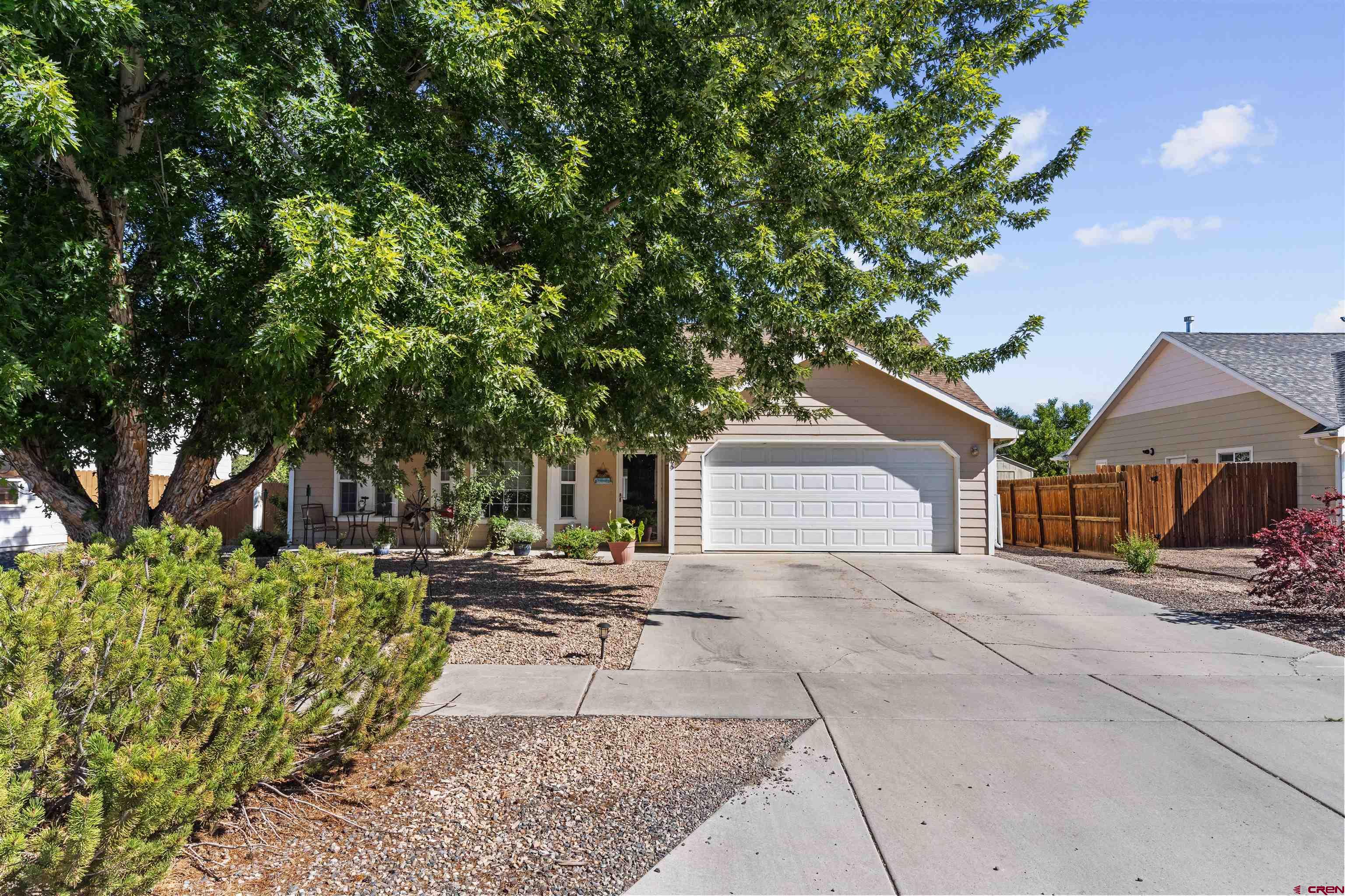 a house with trees in front of it