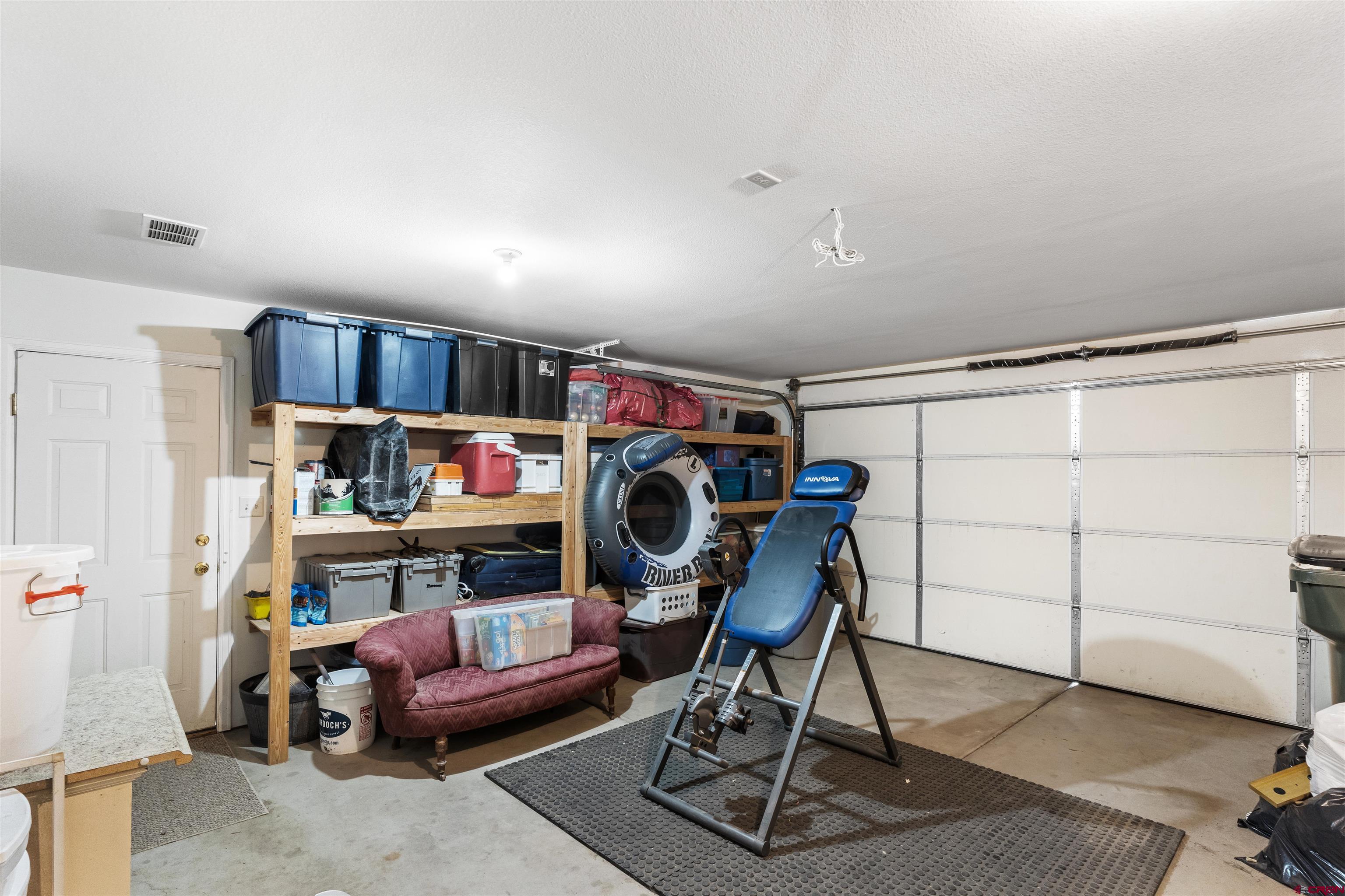 505 20th Street Delta, CO 81416 - Photo 18 of 22 a view of a workspace with furniture and a window