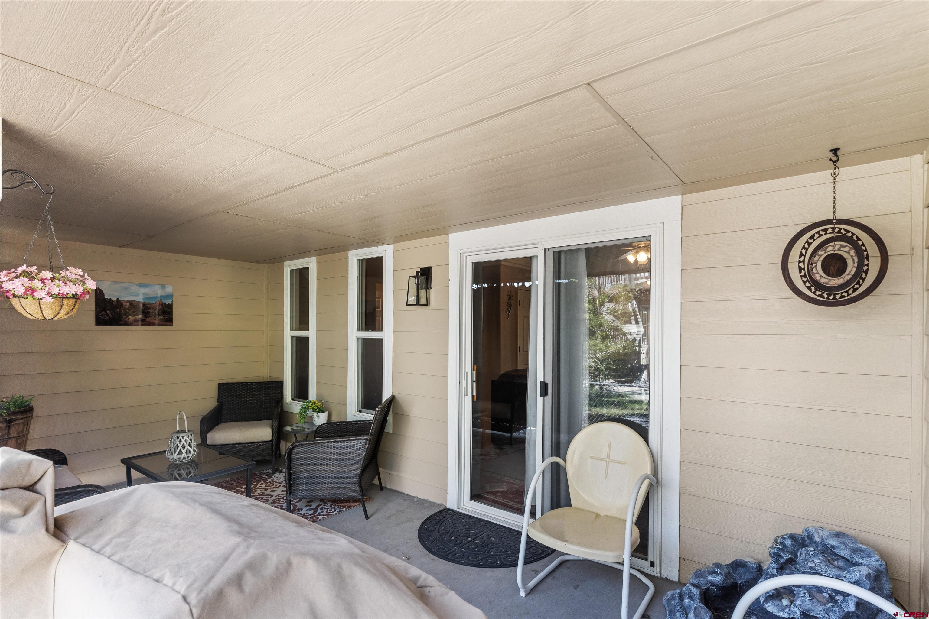 505 20th Street Delta, CO 81416 - Photo 19 of 22 a living room with furniture and a window