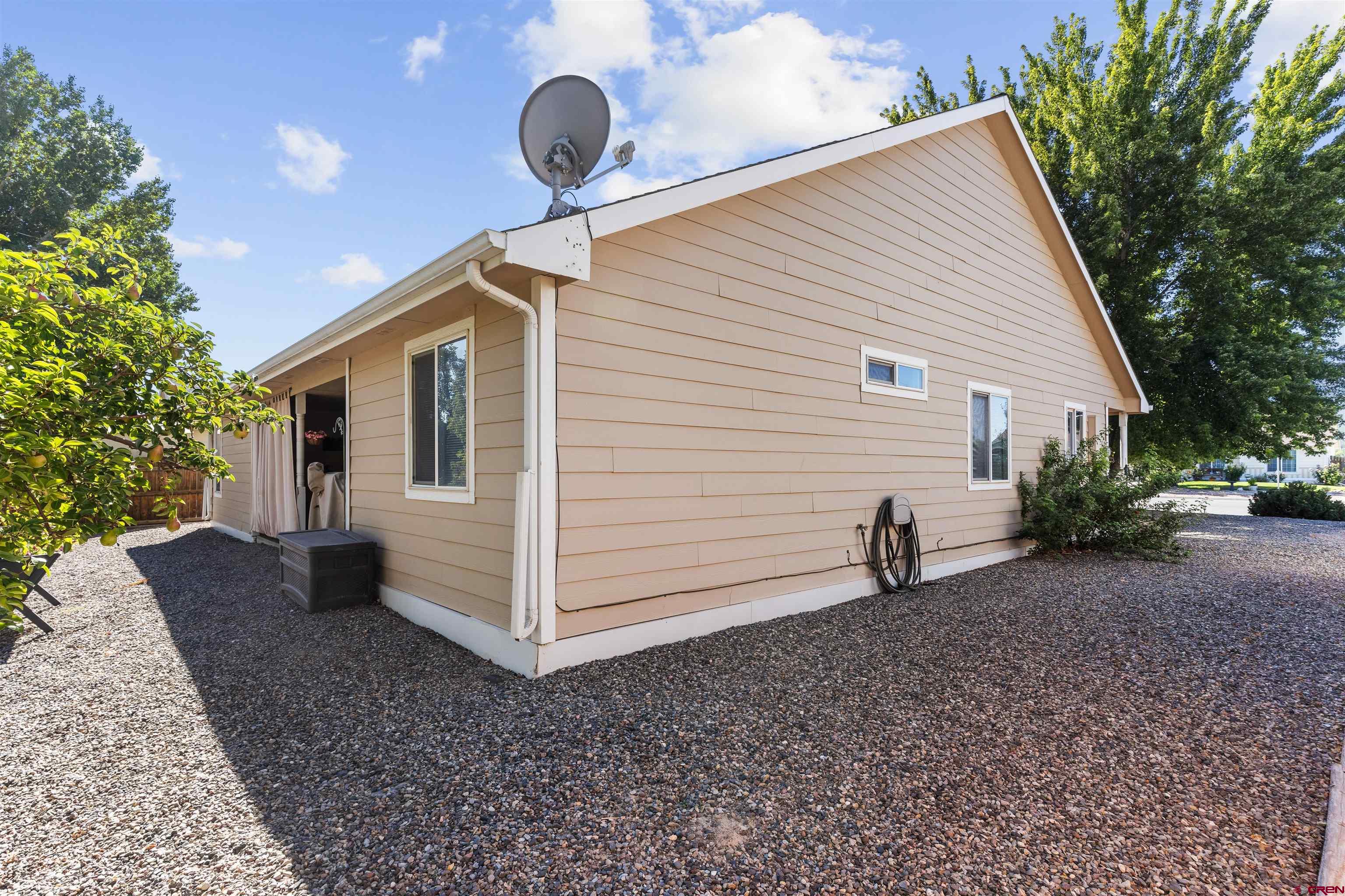 505 20th Street Delta, CO 81416 - Photo 21 of 22 a view of a house with backyard