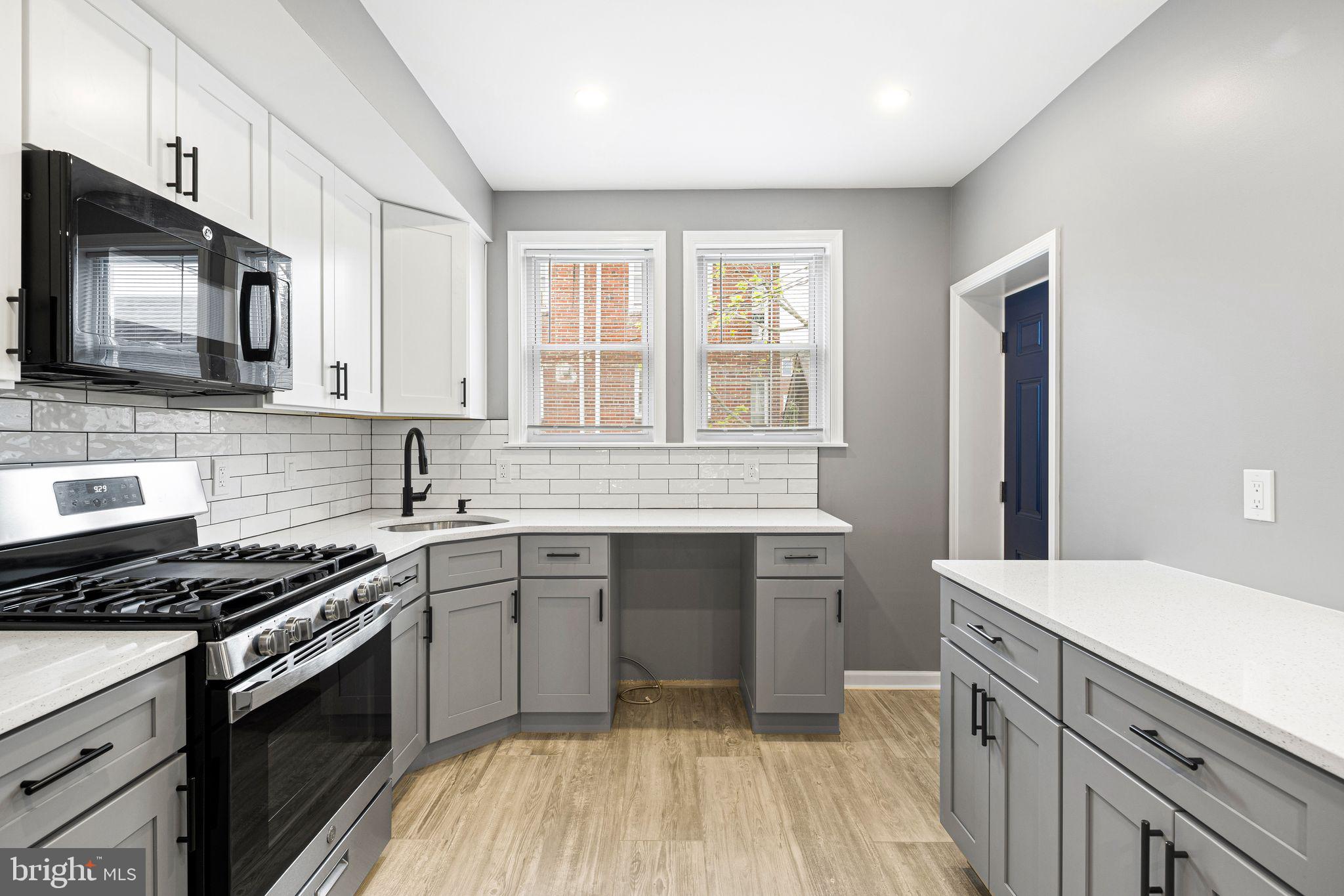 7818 Lennox Road Upper Darby, PA 19082 - Photo 11 of 32 Modern Kitchen w/Stainless Appliances