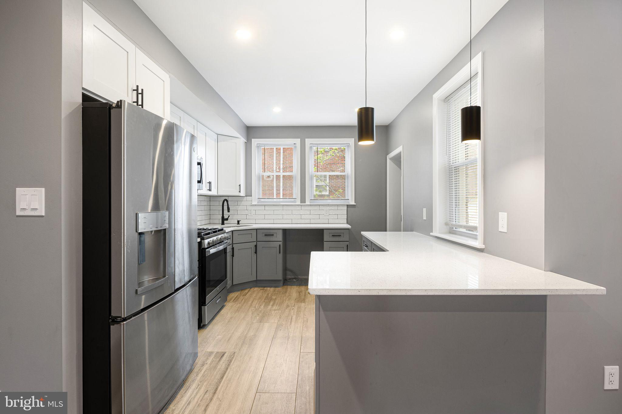 7818 Lennox Road Upper Darby, PA 19082 - Photo 3 of 32 Modern Kitchen w/Stainless Appliances
