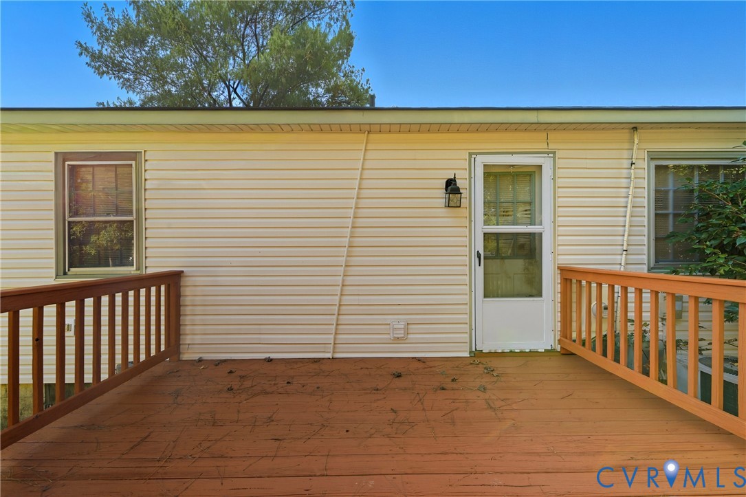 5606 Retriever Road Richmond, VA 23237 - Photo 23 of 27 a view of a porch with wooden floor