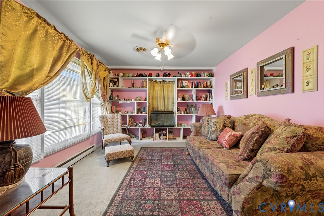 5606 Retriever Road Richmond, VA 23237 - Photo 4 of 27 a living room with furniture and a large window