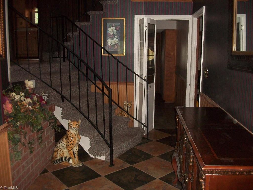 311 Ether Road Star, NC 27356 - Photo 14 of 25 Foyer with steps to living room and upper levels