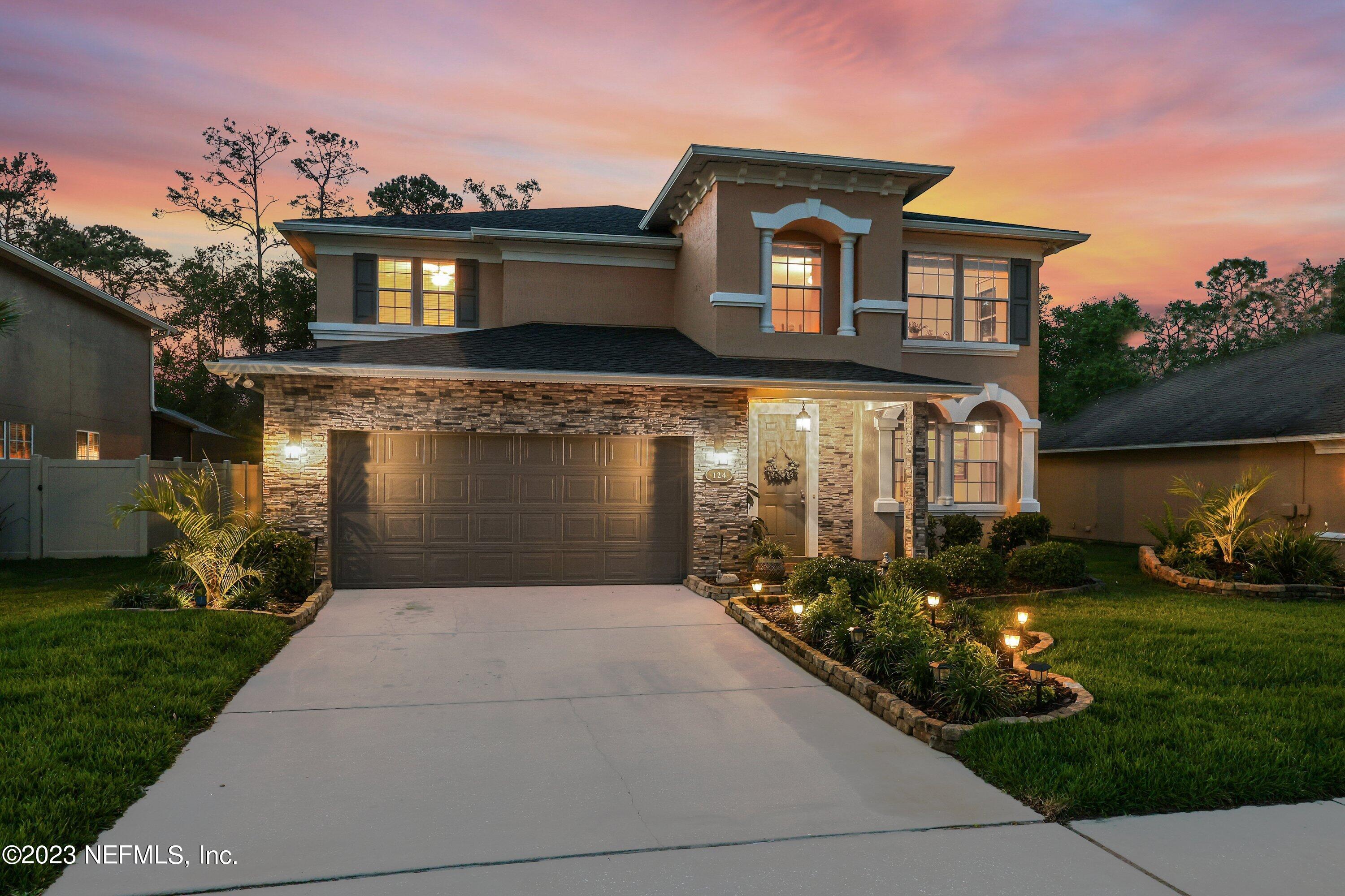 124 Bedstone Drive St. Johns, FL 32259 - Photo 45 of 60 Twilight Front of Home 2