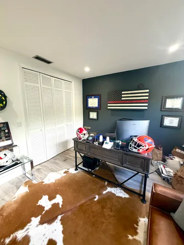 a room with furniture and gym equipment