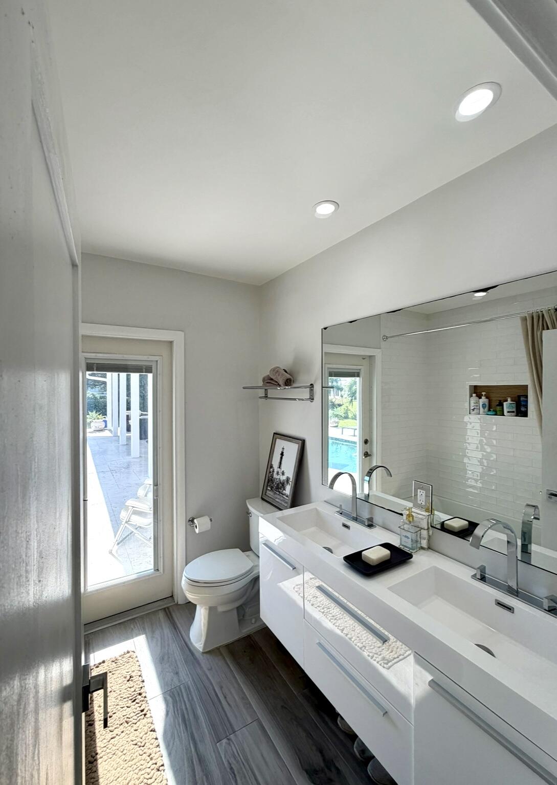 100 Southwest 11th Avenue Boca Raton, FL 33486 - Photo 25 of 34 a room with a large window and furniture