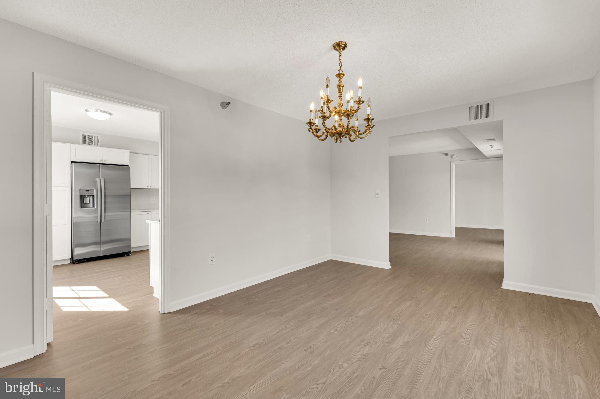 14805 Pennfield Circle, Unit 309 Silver Spring, MD 20906 - Photo 10 of 36 dining room to living area