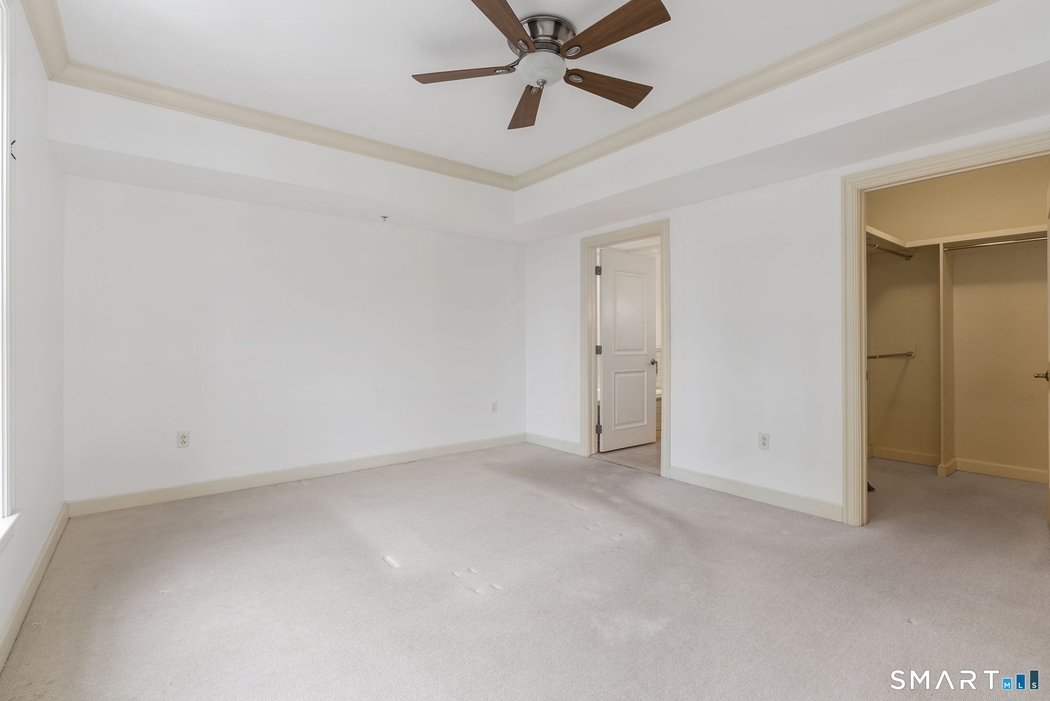 85 Memorial Road, Unit 313 West Hartford, CT 06107 - Photo 20 of 30 Primary Bedroom Suite with a walk-in closet and full bath