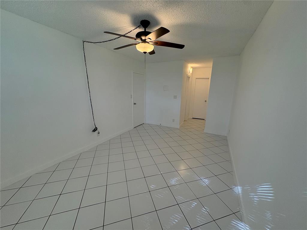 2401 Riverside Drive, Unit 314B Coral Springs, FL 33065 - Photo 7 of 11 a view of an empty room
