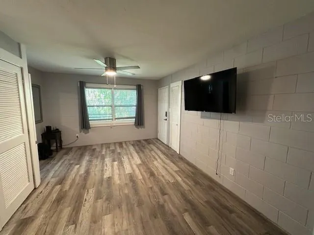 a view of entryway with wooden floor