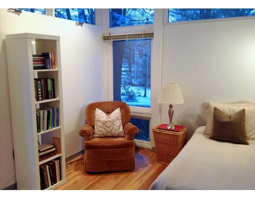 7 Upson Road Wellesley, MA 02482 - Photo 13 of 18 a living room with furniture wall and book shelf