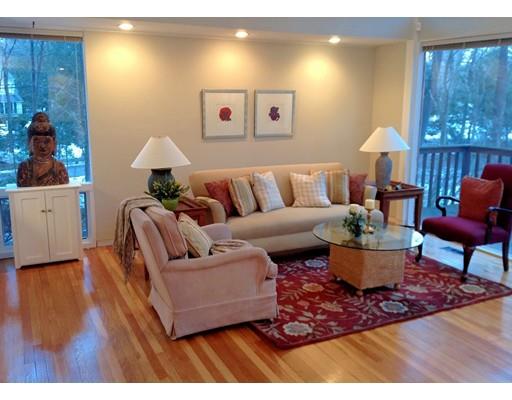 7 Upson Road Wellesley, MA 02482 - Photo 4 of 18 a living room with furniture and a lamp