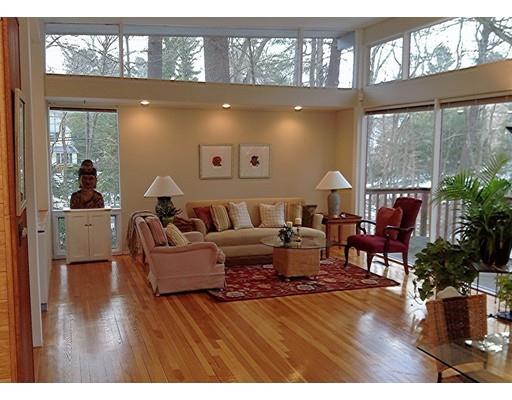 7 Upson Road Wellesley, MA 02482 - Photo 5 of 18 a living room with furniture a large window and wooden floor