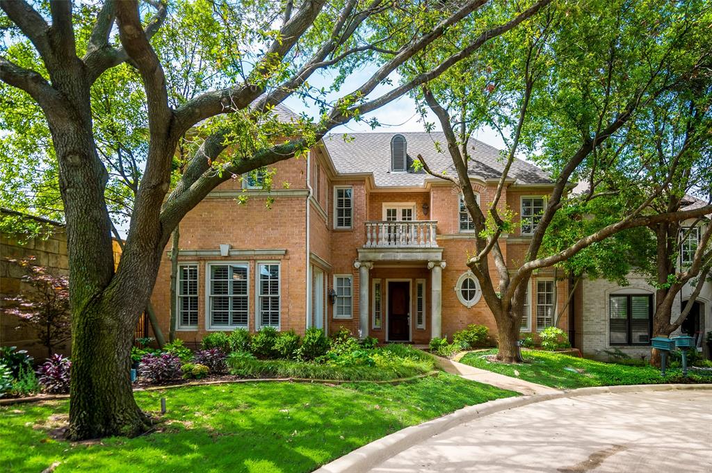 11911 Edgestone Road Dallas, TX 75230 - Photo 1 of 1 front view of a house with a yard