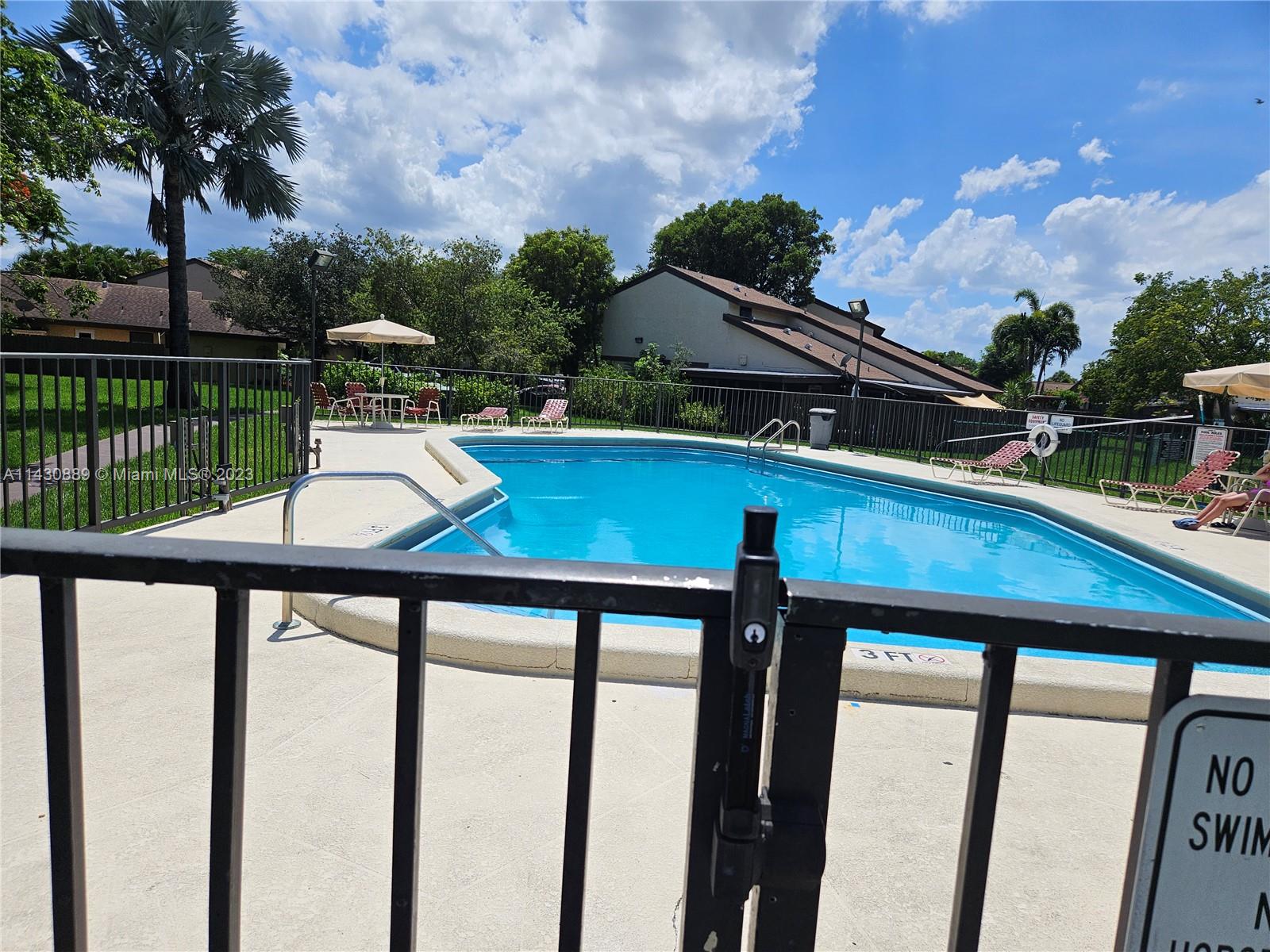9194 Southwest 132nd Lane, Unit 1 Miami, FL 33176 - Photo 3 of 11 a view of a chairs and table in the balcony