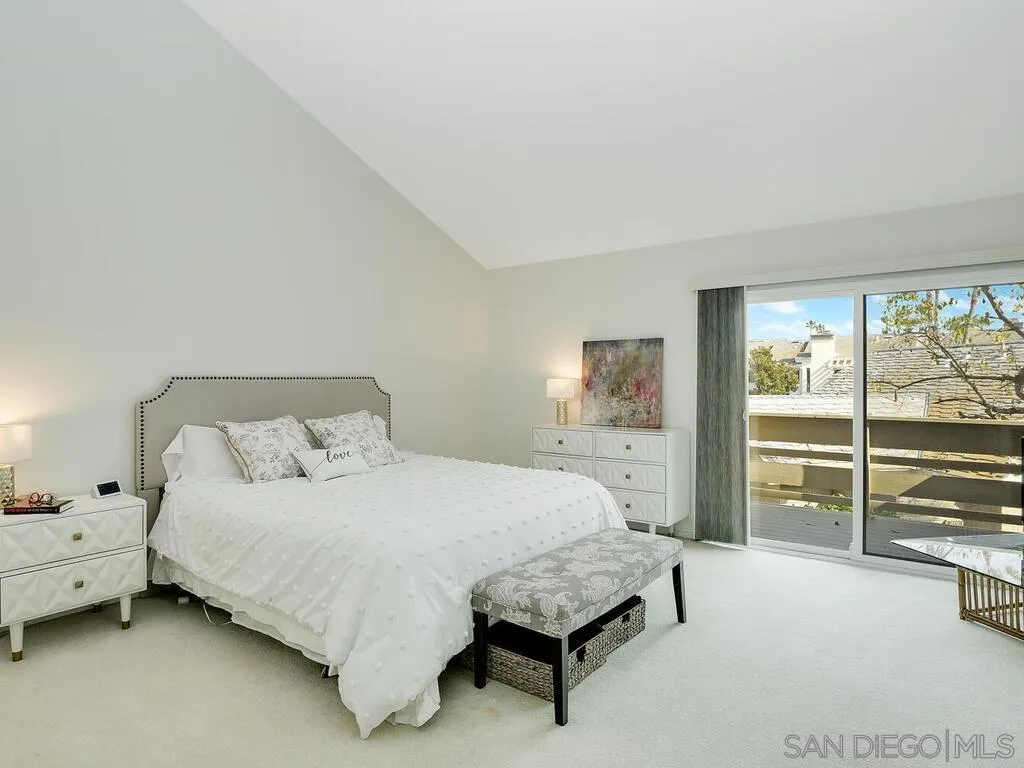 16055 Vista De Golf Rancho Santa Fe, CA 92091 - Photo 14 of 35 a bedroom with a bed and a table next to a window