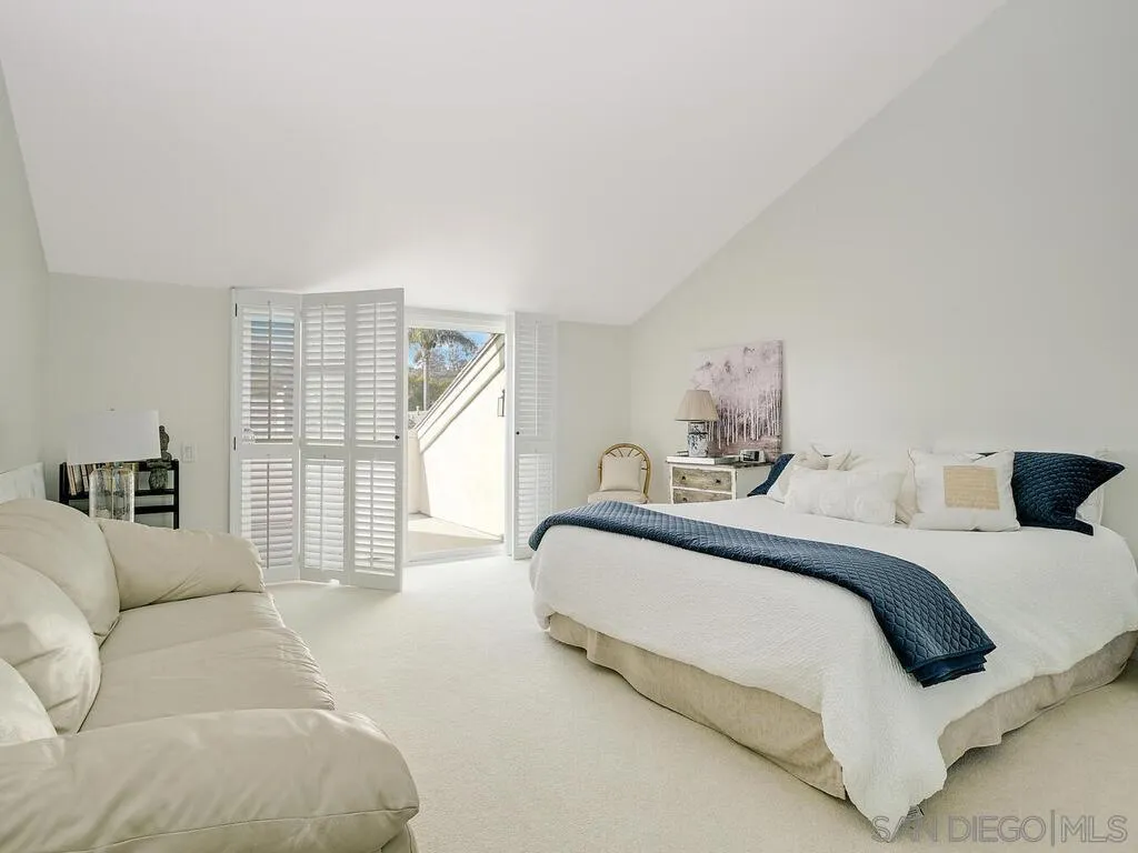 16055 Vista De Golf Rancho Santa Fe, CA 92091 - Photo 23 of 35 a spacious bedroom with a bed and a large window