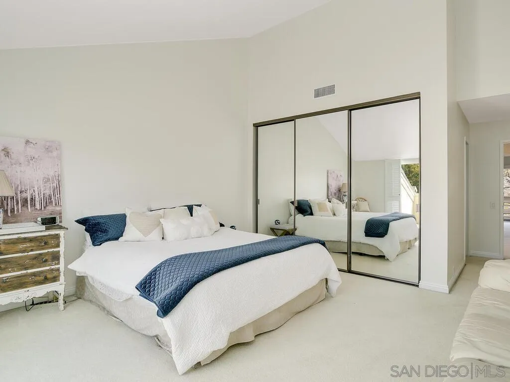 16055 Vista De Golf Rancho Santa Fe, CA 92091 - Photo 25 of 35 a bedroom with a bed and large window