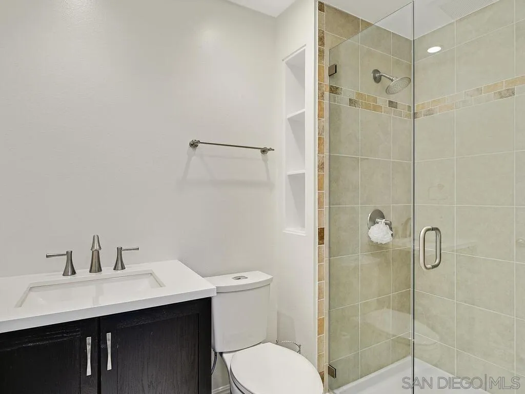 16055 Vista De Golf Rancho Santa Fe, CA 92091 - Photo 29 of 35 a bathroom with a sink toilet and shower