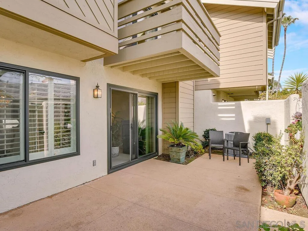 16055 Vista De Golf Rancho Santa Fe, CA 92091 - Photo 31 of 35 a view of a patio with table and chairs and potted plants