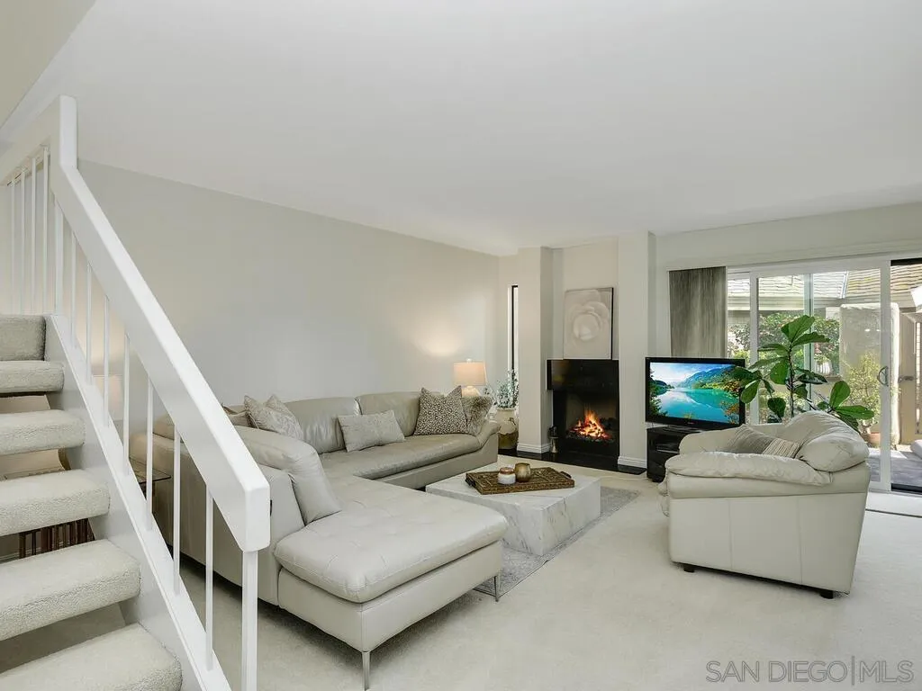 16055 Vista De Golf Rancho Santa Fe, CA 92091 - Photo 4 of 35 a living room with furniture and a fireplace