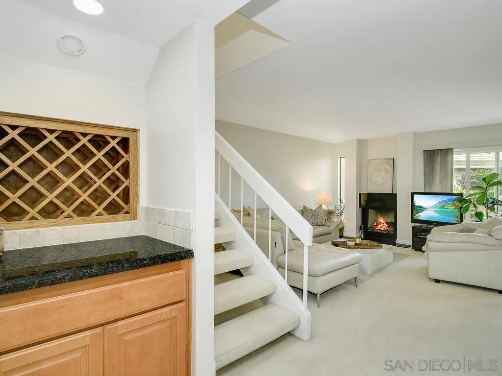 16055 Vista De Golf Rancho Santa Fe, CA 92091 - Photo 7 of 35 a living room with furniture and a fireplace